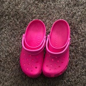Pink crocs
